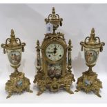 A Lucini Italian clock garniture with cream panels and printed decoration, 40cm high Condition