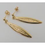 A pair of 9ct gold Runic drop earrings by Ola Gorie, length 3.6cm, weight 3.4gms Condition Report: