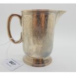 *WITHDRAWN* A Victorian silver jug, Edinburgh 1875, of cylindrical form with foliate and