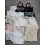 Four ladies handbags and assorted table linen Condition Report: Not available for this lot