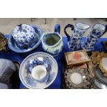 Assorted blue and white pottery including jugs, bowls etc Condition Report: Available upon request