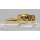 A 22ct gold wedding ring size M, weight 2.2gms and a 18ct gold red gem and diamond ring (one red gem