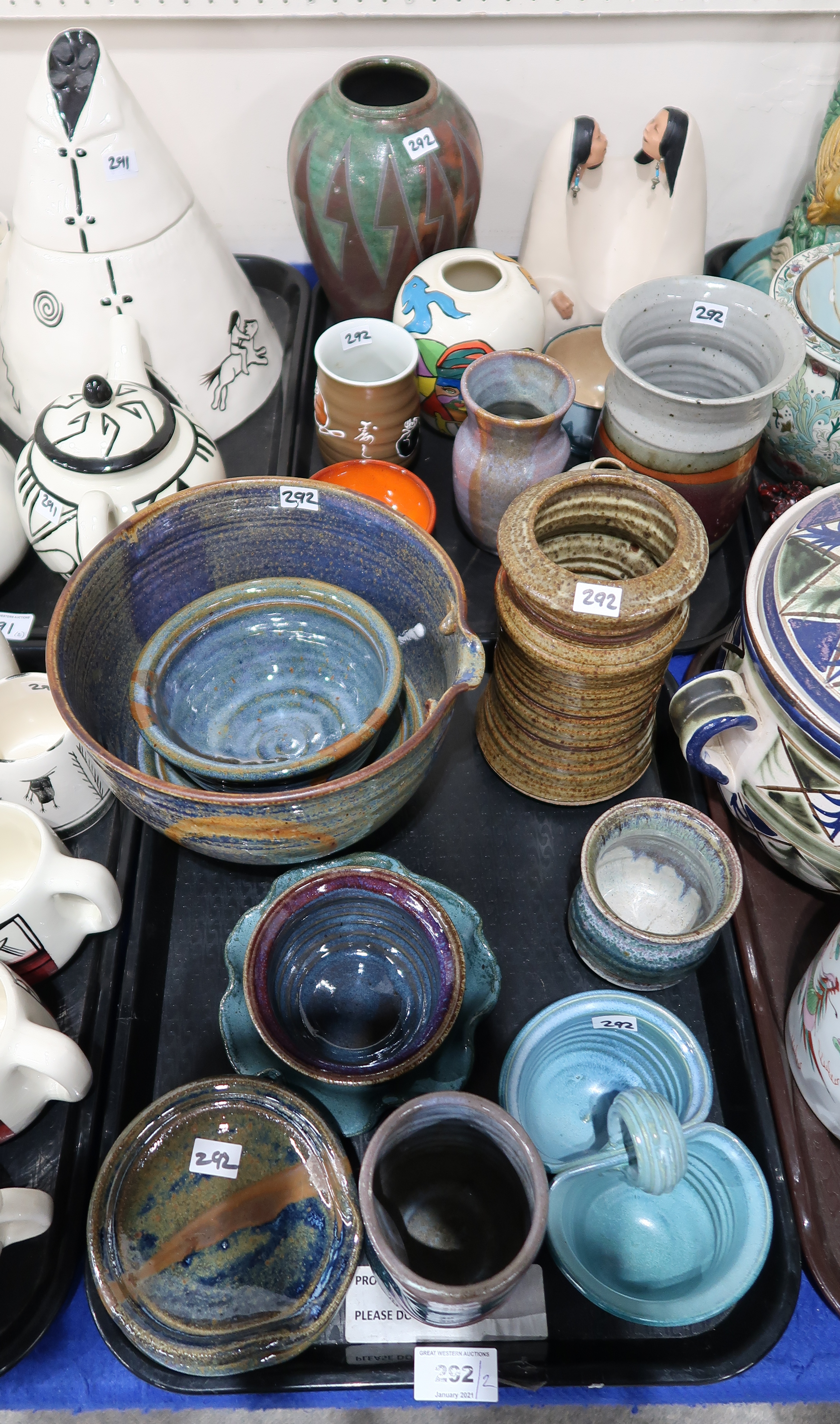 A collection of glazed studio pottery including pieces from Colorado, a Raku glazed vase and other