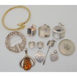 Five pieces of jewellery made by Vicki Ambery-Smith in the shape of the Globe theatre in London,