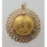 An 1890 full gold sovereign in a 9ct gold pendant mount, diameter 3.8cm, weight 12.6gms Condition