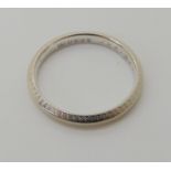 An 18ct white gold wedding ring size L, weight 2.4gms Condition Report: