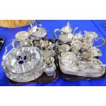 A lot comprising two tray lots of EP - Kettle on stand, dishes, teapots, loose cutlery Condition