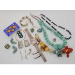 A large string of turquoise beads, a Radley watch and bracelet, a pair of Navajo bear earrings and