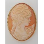 A 9ct gold mounted large cameo brooch, 6.3cm x 5cm, 17.7gms Condition Report: Available upon