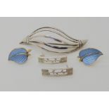 A Danish silver brooch by JUST, a pair of silver gilt and enamel leaf earrings and a pair of Ola