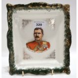 A pottery wall plaque/dish depicting Maj. General Hector A. MacDonald C.B D.S.O A.D.C Condition