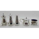 A lot comprising a silver salt and pepper, Sheffield 1947 and three other silver condiments (5)