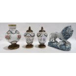 A Sevres porcelain garniture comprising vase, 17cm high and two lidded jars together with a