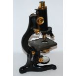 A W. Watson & Sons Ltd "Service" black lacquer and brass microscope, No.57486 Condition Report: