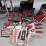 A collection of Native American cushions, chair pads, rugs and table covers Condition Report: Not