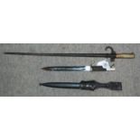 Two various bayonets in metal scabbards, 65cm overall and 40cm Condition Report: Available upon