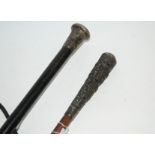 A silver-topped ebony cane, parasol with white-metal handle and Irish club (3) Condition Report: