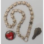 A white metal Victorian locket chain and other items Condition Report: Not available for this lot