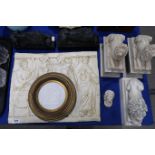 A collection of classical lions, a plaster plaque, a framed roundel and a small mask Condition