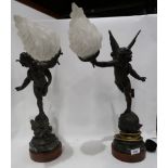 A pair of cherub table lamps with glass flame shades Condition Report:
