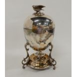 A silver plated egg coddler, the lower with eagle finial, 24cm high Condition Report: Available upon