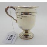 A silver christening mug, Sheffield 1920, 8.5cm high, 106gms Condition Report: Available upon