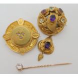 A bright yellow metal Victorian brooch with locket back and set with rose cut diamonds, diameter 3.