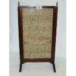 A George II alphabet sampler by Ameila Cove, 1752? on cheval style stand, 39 x 22cm Condition