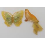 A horn butterfly brooch (unsigned) together with a horn bird brooch (needs some tlc) Condition