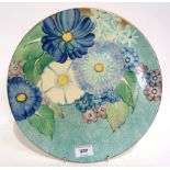 A Gray's pottery wall platter hand painted with flowers, 33cm diameter Condition Report: Available