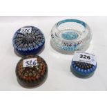 A small Perthshire millefiori paperweight, two other millefiori paperweights and a John Deacons