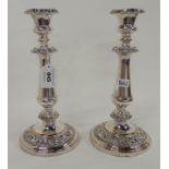 A pair of silver plated candlesticks, 27cm high Condition Report: Available upon request