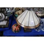 A Leaded glass table lamp and a shade Condition Report: Available upon request