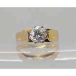 An 18ct gold solitaire diamond ring set with an estimated approx 0.60ct brilliant cut, finger size