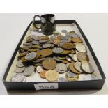 A lot comprising a quantity of mixed coins, mainly foreign and an EP christening mug Condition