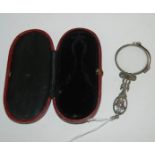 A cased pince-nez with gem-set handle Condition Report: Available upon request