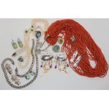 A coral bead statement necklace, a pair of large Tabra 'storm' earrings, and a collection of