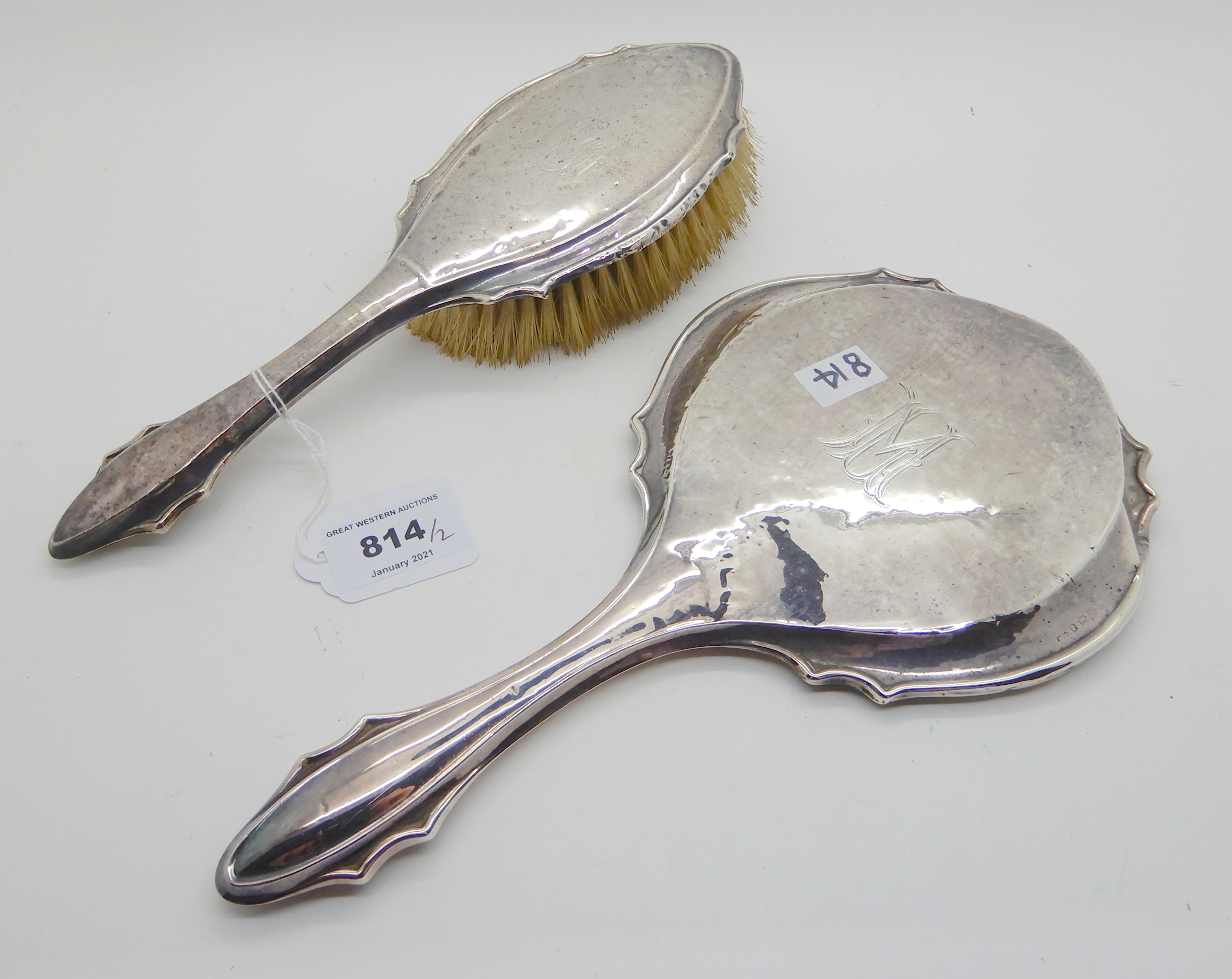 A silver brush and mirror set (2), Birmingham 1923 Condition Report: Available upon request