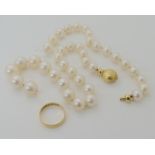 An 18ct gold wedding ring, size P, together with an (af) cultured pearl necklace with an 18ct gold