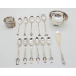 A lot comprising a silver finger bowl, Sheffield marks, a silver napkin ring, five silver spoons,