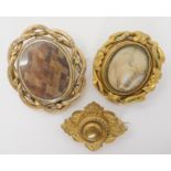 Two gold plated mourning hair locket brooches and another brooch Condition Report: Not available for