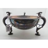 A silver plated bowl on three feet modelled as mythical beasts, 26cm diameter Condition Report: