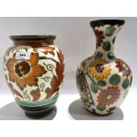 Two Gouda vases, one in Averil pattern, 27cm high, and the other in Regina pattern, decorated with a