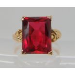 A 14k gold red glass gem ring, size S1/2, 5.4gms Condition Report: Available upon request