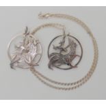 Two silver Maeshowe dragon pendants by Malcolm Gray of Ortak, each diameter 3.5cm Condition