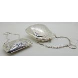 A lot comprising two silver purses, Birmingham 1918, 10.5cm x 9.5cm and Birmingham 1915, 5cm x