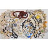 A collection of vintage costume jewellery to include a brooch by Coro, micro mosaic bracelet and