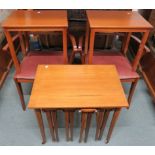 A teak table with four nesting tables, two teak side tables and two armchairs (5) Condition