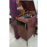 A Unitone gramophone in cabinet Condition Report: Available upon request