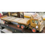 A wooden model of an articulated truck, S Gardner, Timber, 39cm high x 140cm long Condition